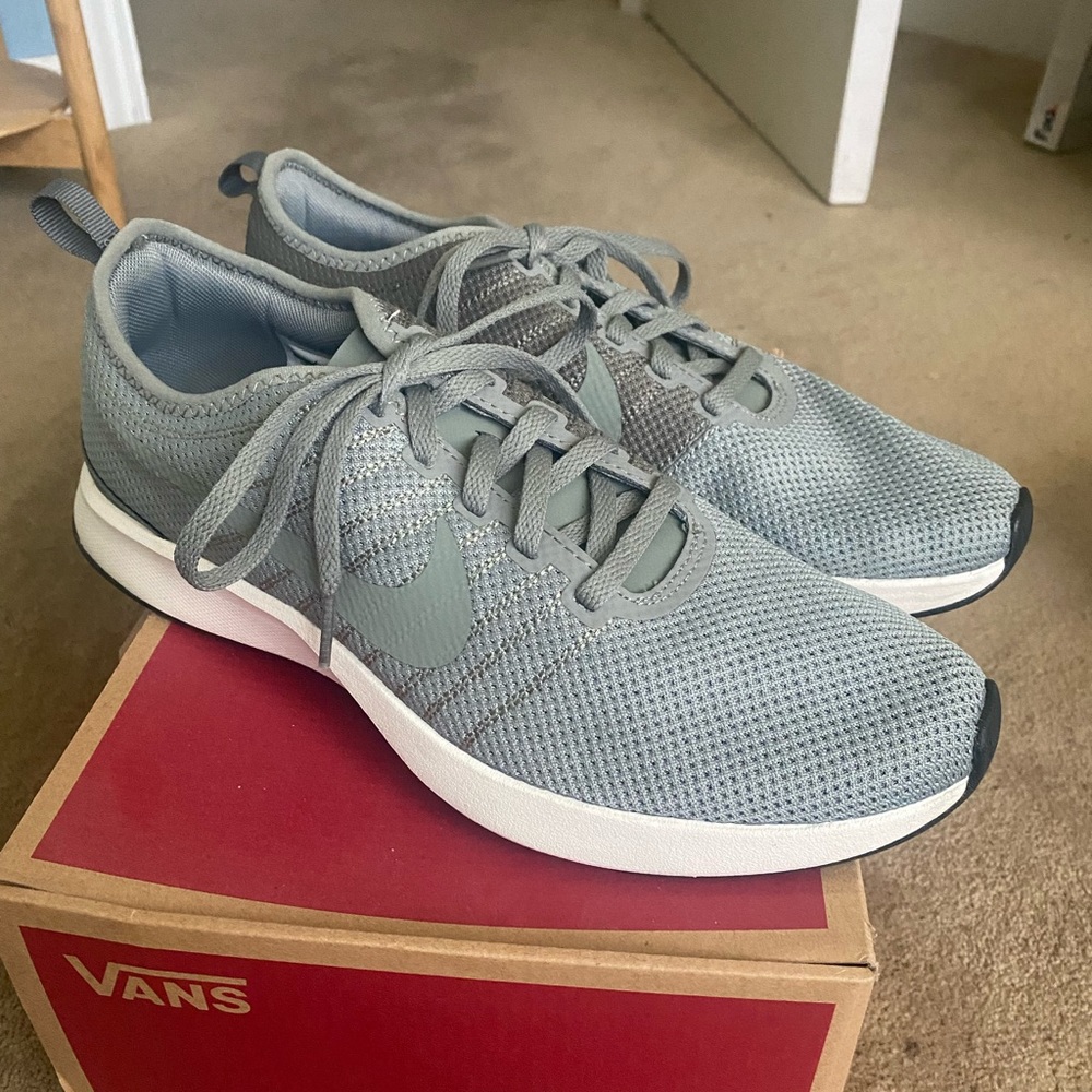 Green Nike training shoes